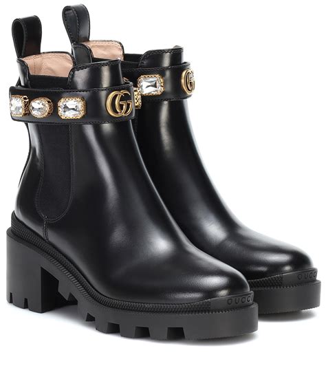 gucci black lace up boots with white heart on sole|Gucci signoria ankle boots.